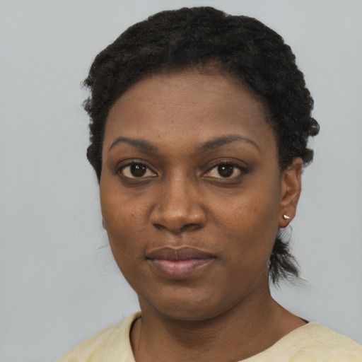 Neutral black young-adult female with short  black hair and brown eyes