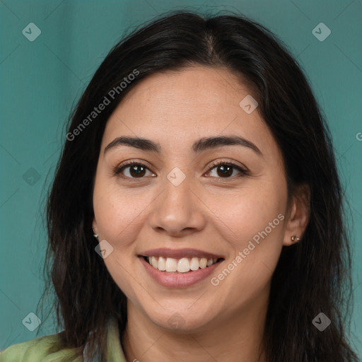 Joyful white young-adult female with long  brown hair and brown eyes