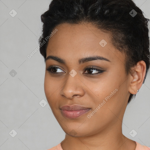 Joyful latino young-adult female with short  black hair and brown eyes