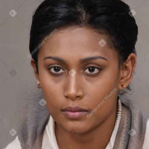 Neutral black young-adult female with short  brown hair and brown eyes