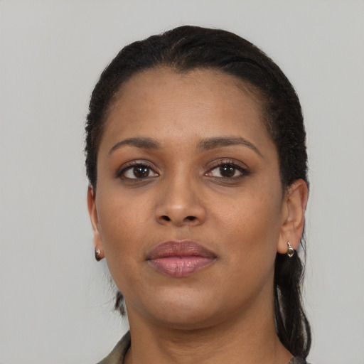 Neutral black young-adult female with long  black hair and brown eyes