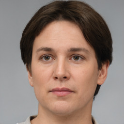 Neutral white young-adult female with short  brown hair and brown eyes