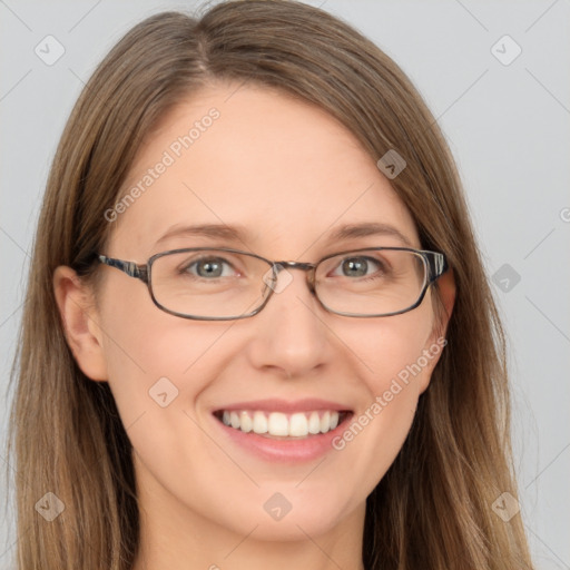 Joyful white young-adult female with long  brown hair and grey eyes