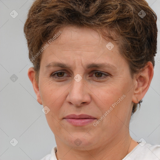 Joyful white adult female with short  brown hair and brown eyes