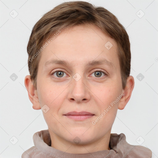 Joyful white young-adult female with short  brown hair and grey eyes