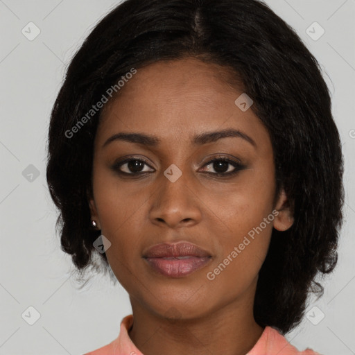 Joyful black young-adult female with medium  black hair and brown eyes