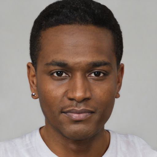 Neutral black young-adult male with short  black hair and brown eyes