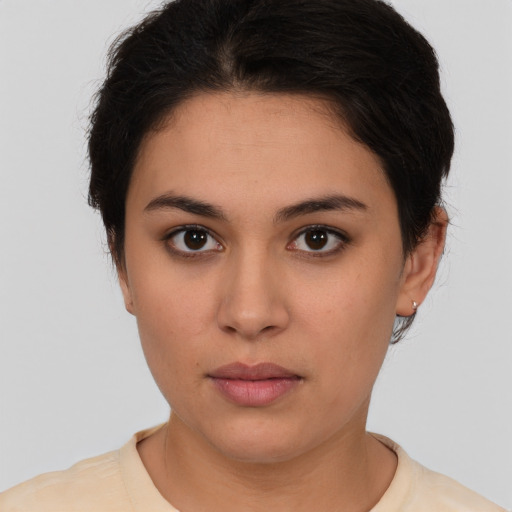 Neutral white young-adult female with short  brown hair and brown eyes