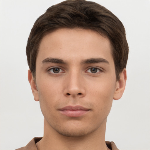 Neutral white young-adult male with short  brown hair and brown eyes