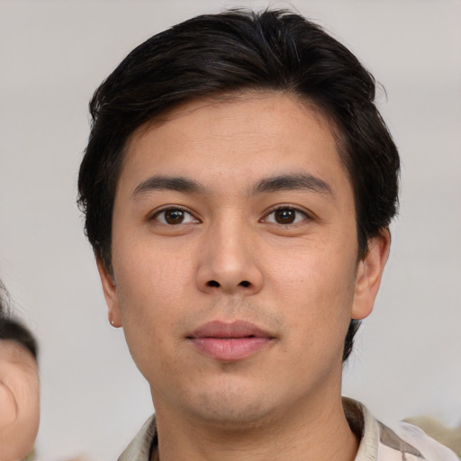 Neutral asian young-adult male with short  brown hair and brown eyes