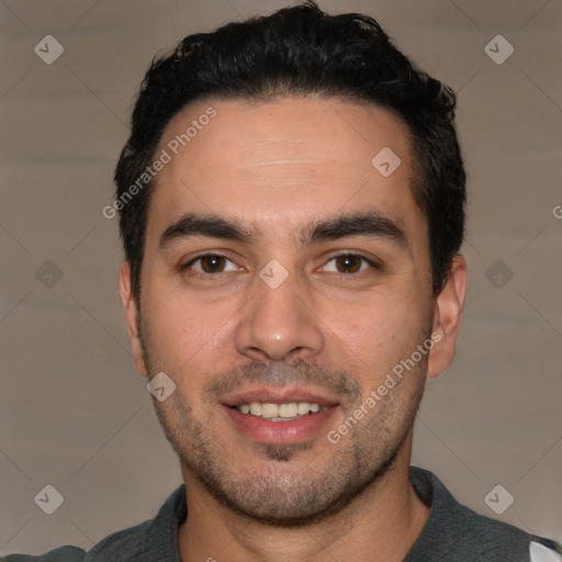 Joyful white young-adult male with short  black hair and brown eyes
