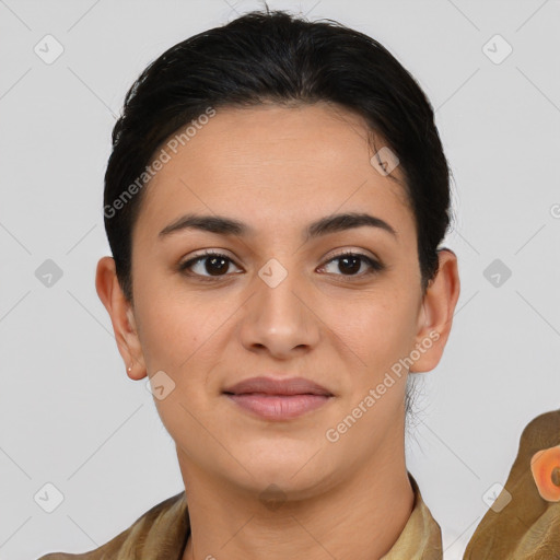 Joyful latino young-adult female with short  brown hair and brown eyes