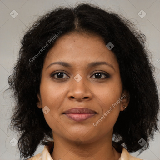 Joyful black young-adult female with medium  brown hair and brown eyes