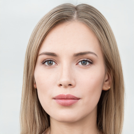 Neutral white young-adult female with long  brown hair and green eyes