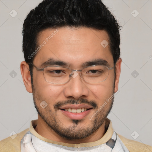 Joyful asian young-adult male with short  black hair and brown eyes