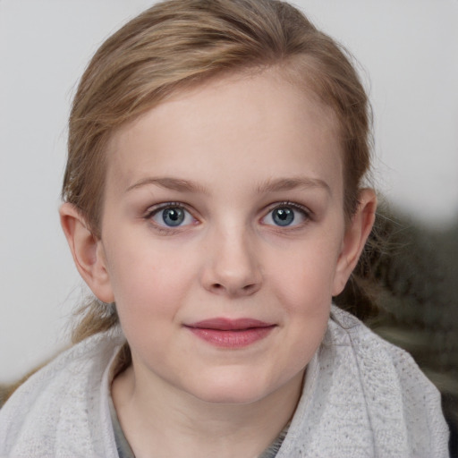 Joyful white child female with medium  brown hair and blue eyes