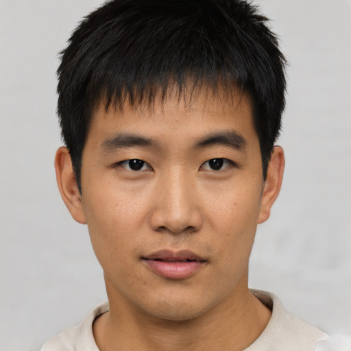 Neutral asian young-adult male with short  black hair and brown eyes