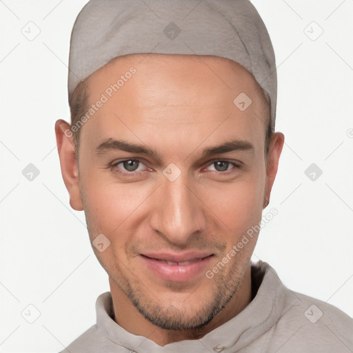 Joyful white adult male with short  brown hair and brown eyes