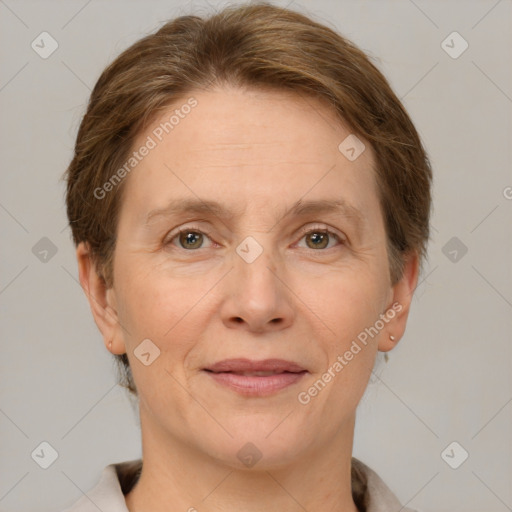 Joyful white adult female with short  brown hair and grey eyes