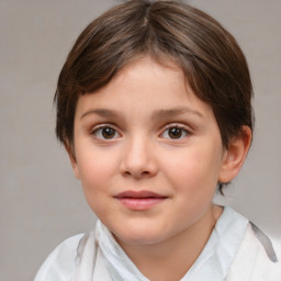 Joyful white child female with medium  brown hair and brown eyes