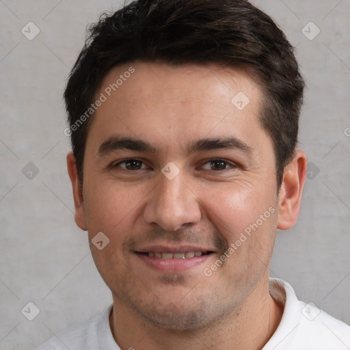 Joyful white young-adult male with short  brown hair and brown eyes