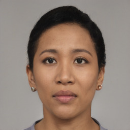 Neutral asian young-adult female with short  brown hair and brown eyes