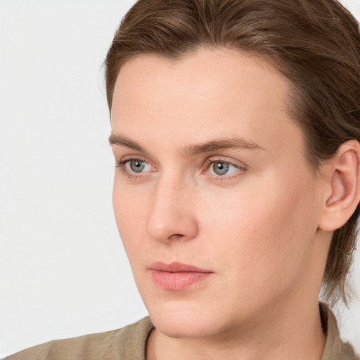 Neutral white young-adult female with medium  brown hair and grey eyes