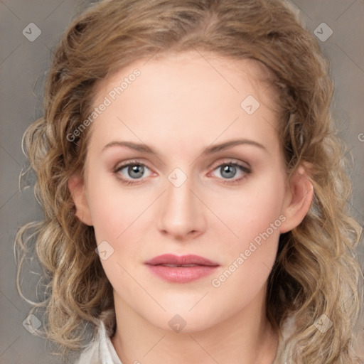 Joyful white young-adult female with medium  brown hair and green eyes