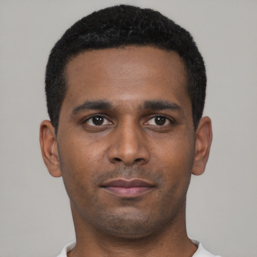 Neutral black young-adult male with short  brown hair and brown eyes