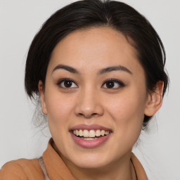 Joyful white young-adult female with medium  brown hair and brown eyes