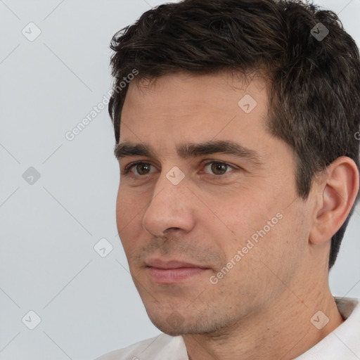 Neutral white adult male with short  brown hair and brown eyes