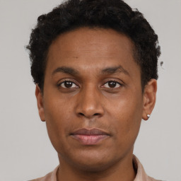 Neutral black young-adult male with short  brown hair and brown eyes