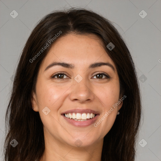 Joyful white young-adult female with long  brown hair and brown eyes