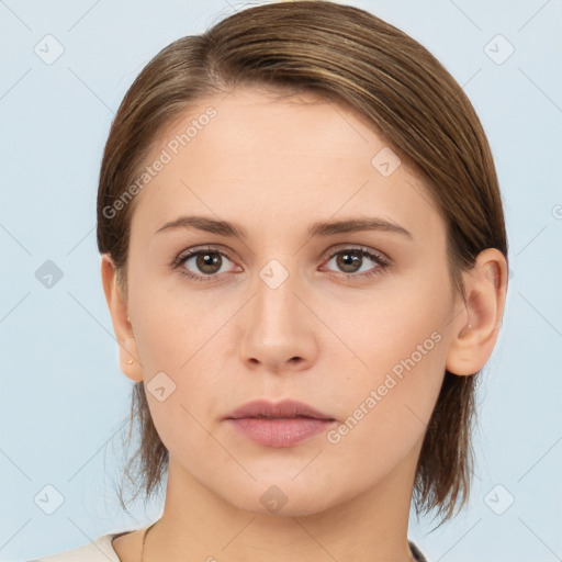 Neutral white young-adult female with medium  brown hair and brown eyes