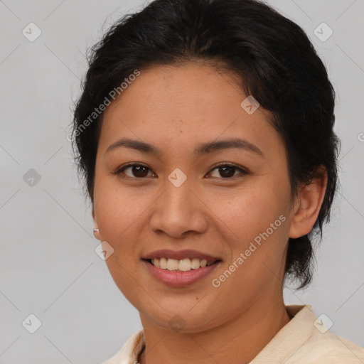 Joyful asian young-adult female with short  brown hair and brown eyes