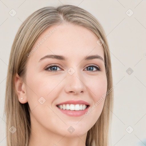 Joyful white young-adult female with long  brown hair and blue eyes