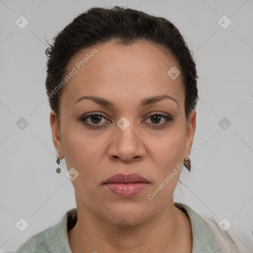 Joyful latino young-adult female with short  brown hair and brown eyes