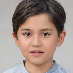 Joyful white child female with short  brown hair and brown eyes