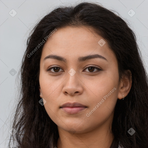 Neutral latino young-adult female with long  brown hair and brown eyes