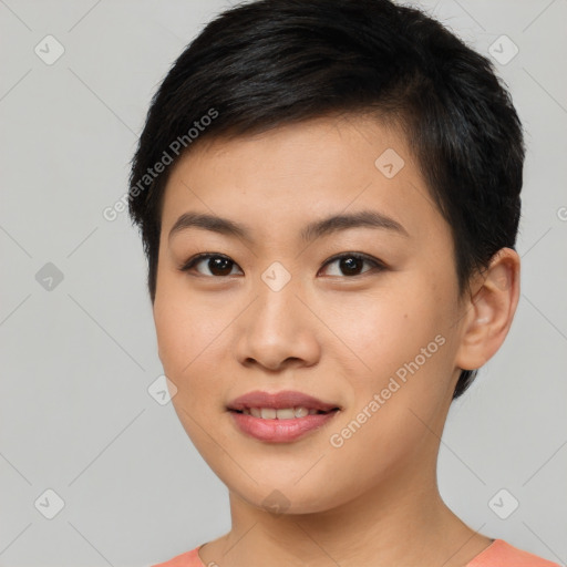 Joyful asian young-adult female with short  black hair and brown eyes