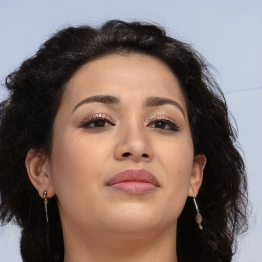 Joyful asian young-adult female with long  brown hair and brown eyes