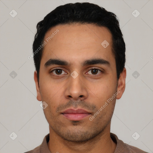 Neutral latino young-adult male with short  black hair and brown eyes
