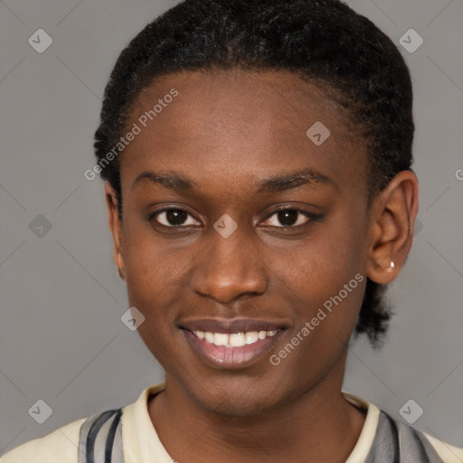 Joyful black young-adult female with short  brown hair and brown eyes