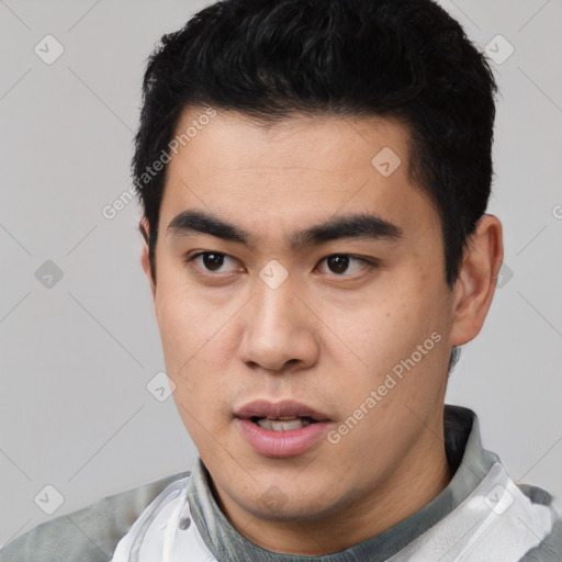 Neutral asian young-adult male with short  black hair and brown eyes