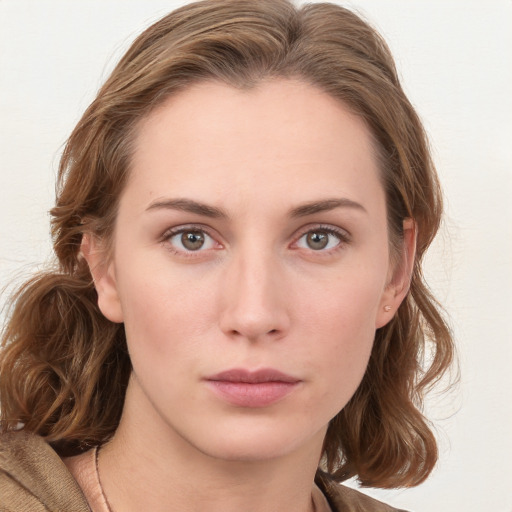 Neutral white young-adult female with medium  brown hair and brown eyes