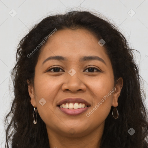 Joyful latino young-adult female with long  brown hair and brown eyes