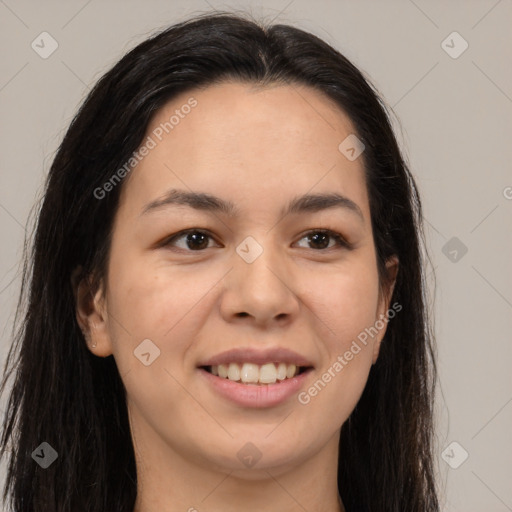 Joyful asian young-adult female with long  brown hair and brown eyes