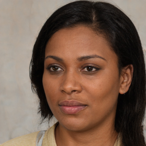 Neutral latino young-adult female with medium  brown hair and brown eyes
