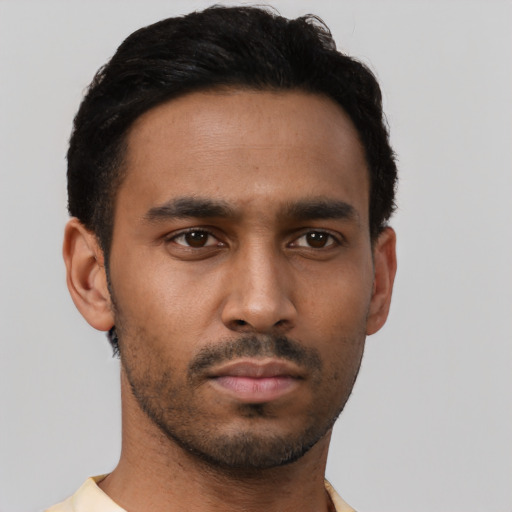 Neutral black young-adult male with short  black hair and brown eyes