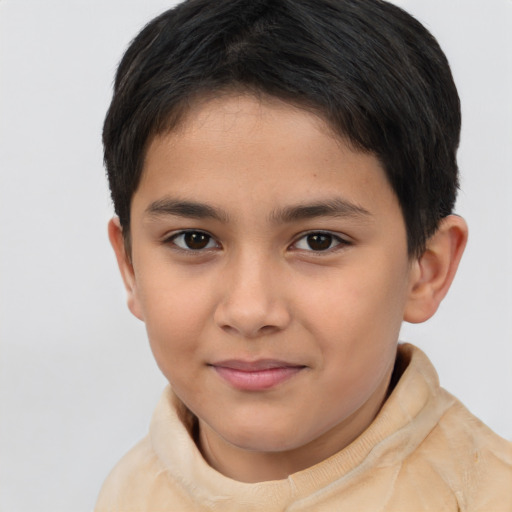 Joyful asian child female with short  brown hair and brown eyes